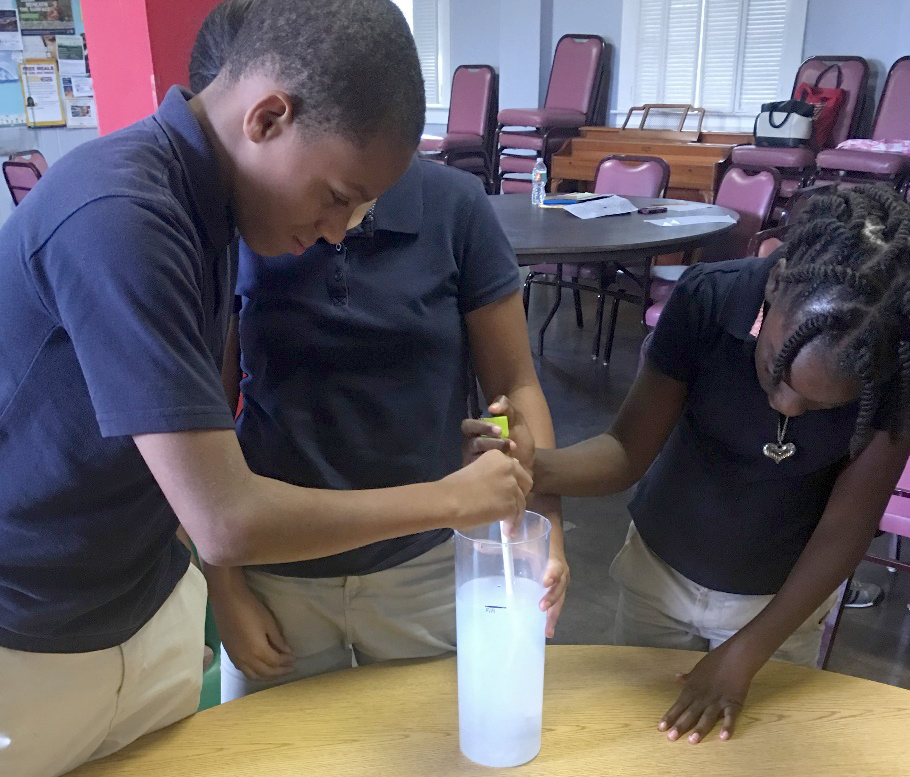Students doing a science experiment.