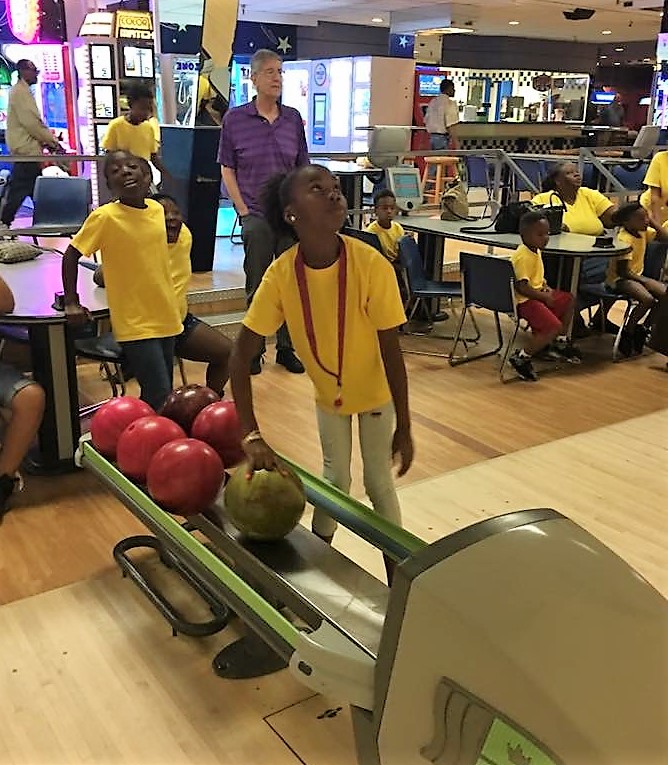 Students bowling.