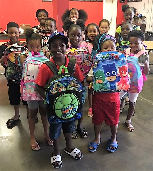 Students with backpacks.
